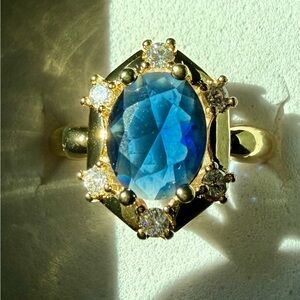 NEW! Pretty Bird Jewelry Gold Ring with Blue Oval Gemstone and Diamond Halo